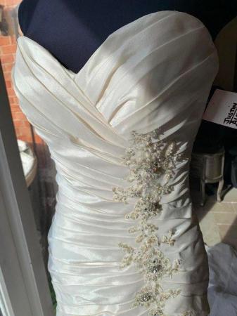 Image 3 of Justin Alexander Wedding dress. New size 12