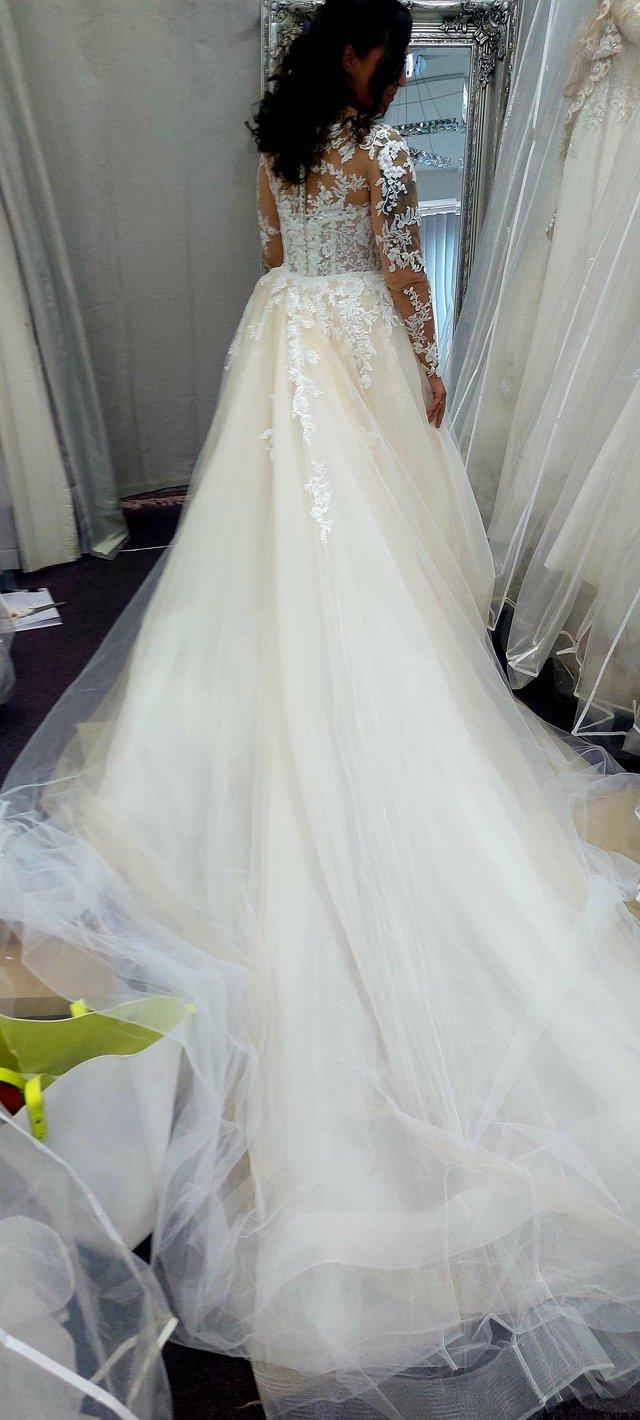 Preview of the first image of Wedding Dress with detachable train.