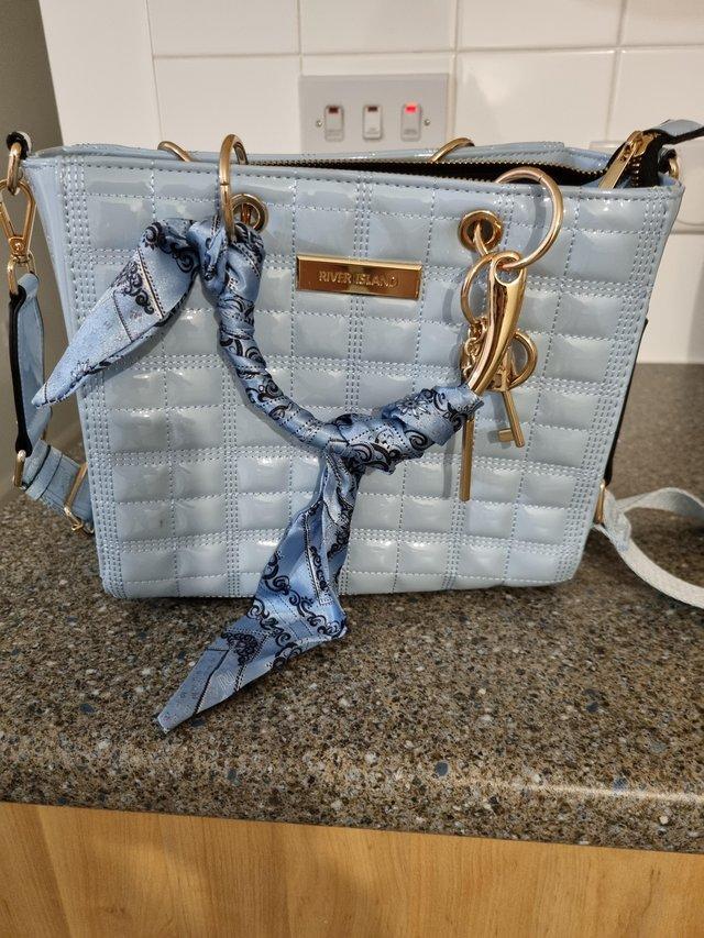 Preview of the first image of Beautiful river island handbag.