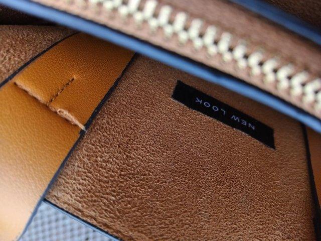 Preview of the first image of New Look Handbag with inside middle zip.