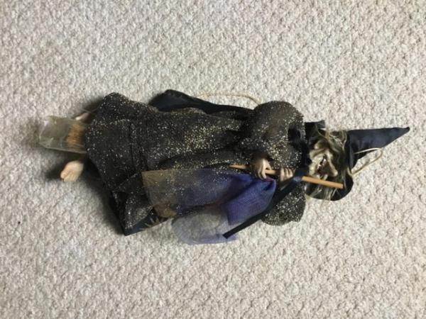 Image 1 of Hanging witch on broom ornament decoration