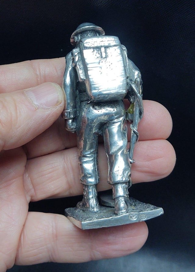 Preview of the first image of Vintage Sculpture Style Figure Of A Soldier.