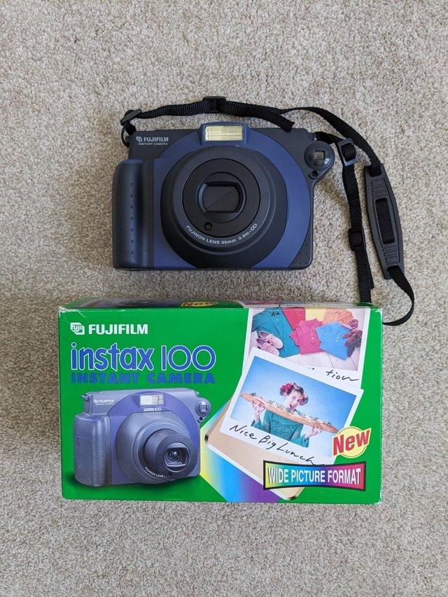 Preview of the first image of Fujifilm Instax 100 Instant Camera.
