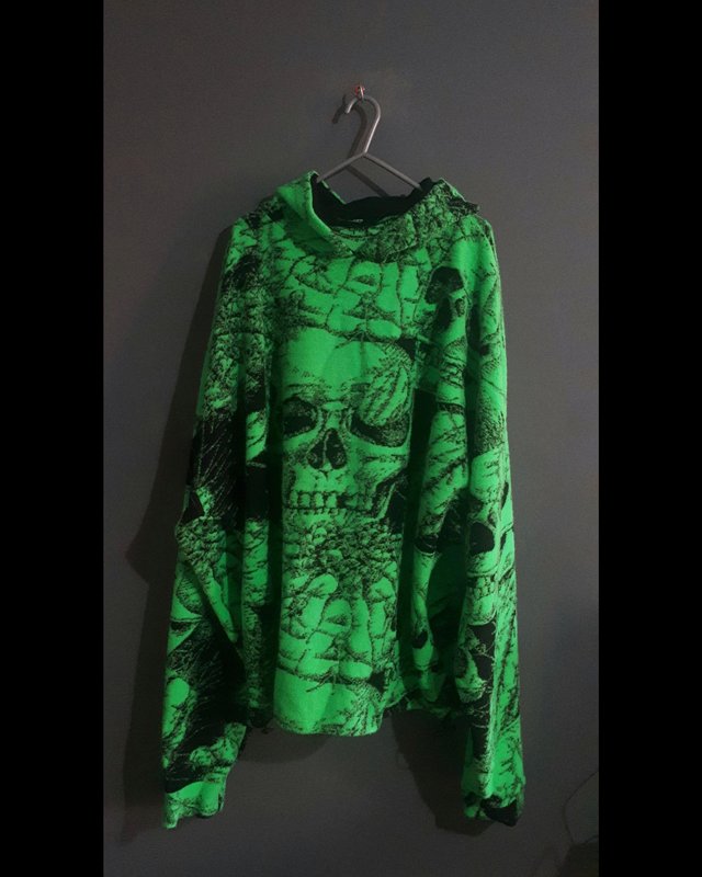 Preview of the first image of Black and neon green hoodie.