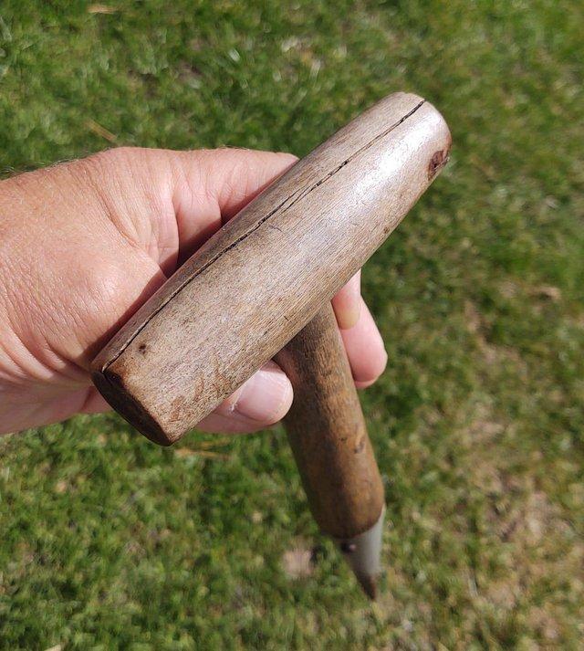 Preview of the first image of A Vintage Wood & Metal Garden Hand Dibber.