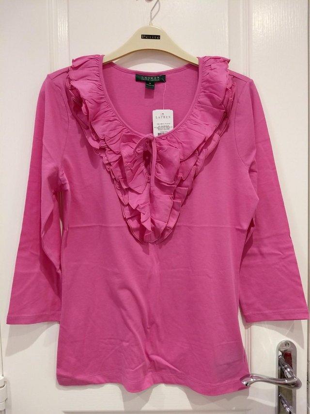 Preview of the first image of Lauren Ralph Lauren Ruffle Front Tissue Cotton Top Pink.