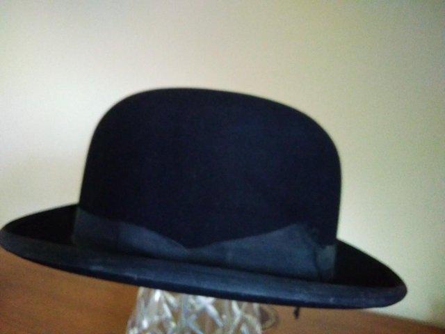 Preview of the first image of Moss Bros. Black bowler/blocker riding hat.