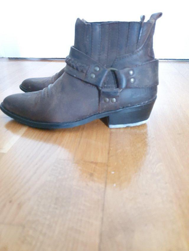 Preview of the first image of Womens size 5/38 western style brown leather ankle boot.