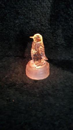 Image 1 of Two penguin light up ornaments + spare batteries - Chatham