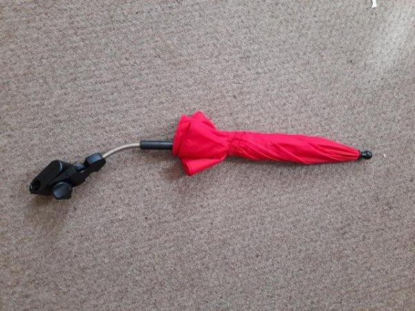 Image 3 of Red pushair parasol as new cond