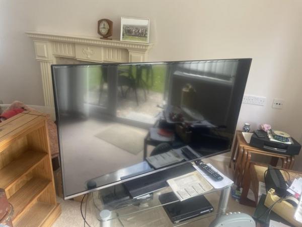 Image 1 of Panasonic television 49 inch screen and DVD player and stand