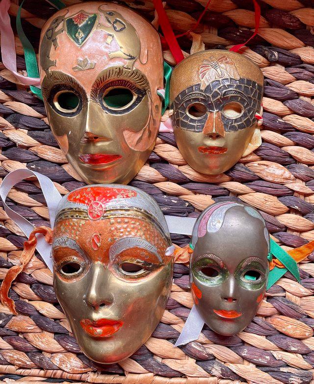 Preview of the first image of 4 1950's Solid Brass Hand Painted Face Masks Wall Art.