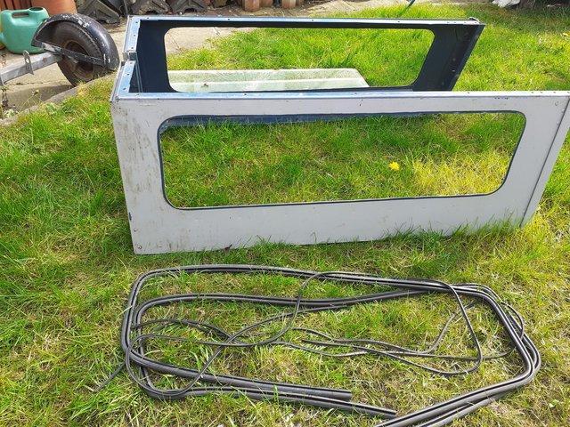 Preview of the first image of Used Landrover defender side windows..