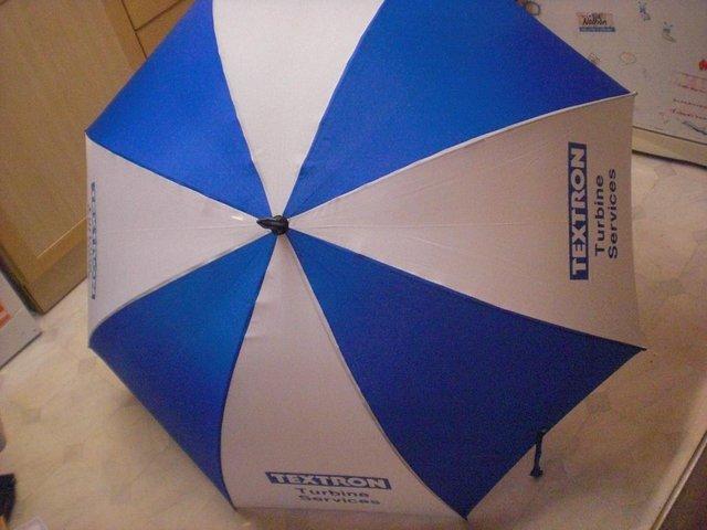 Preview of the first image of Unique Golf Umbrella New And Unused BNWOT.