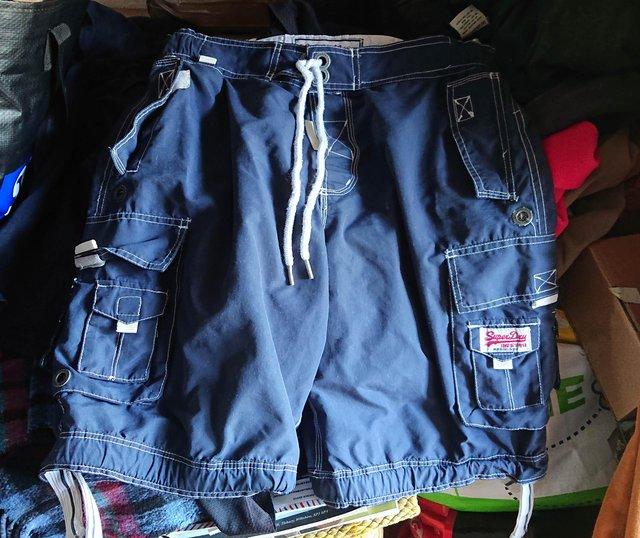 Preview of the first image of Superdry Swim Shorts Blue / Large.