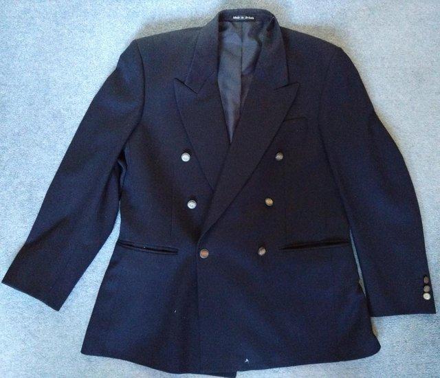 Preview of the first image of Dunn & Co. navy double-breasted suit wool jacket- size 40L.