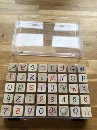 Image 4 of Alphabet wooden stamp set containing 40 stamps