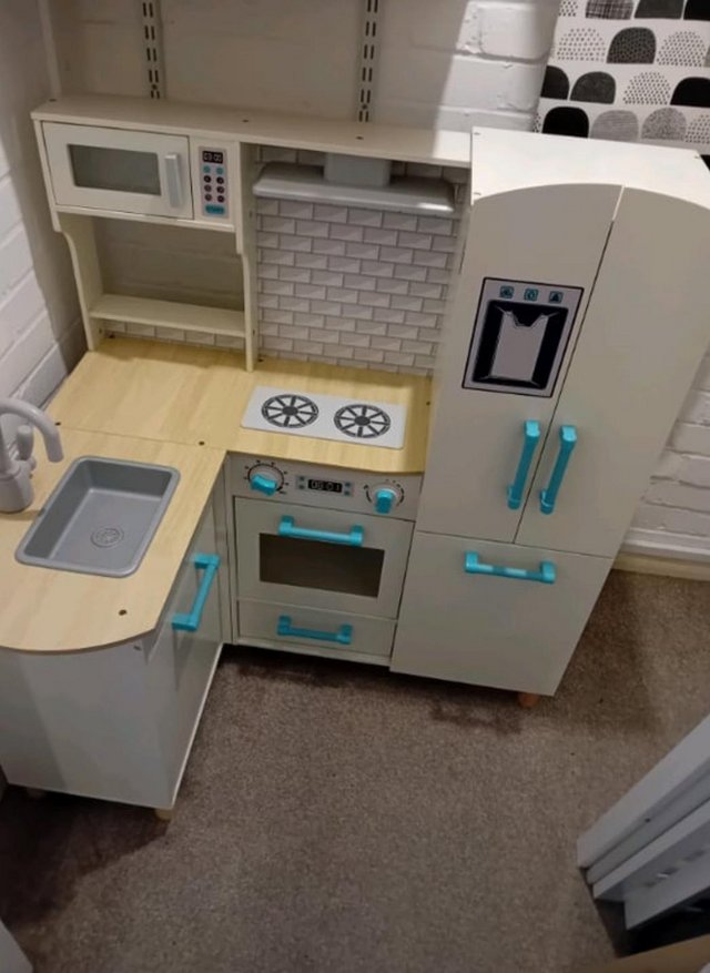 Preview of the first image of Wooden Corner Play Kitchen With Accessories Included.
