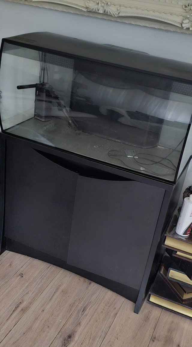 Preview of the first image of Aquarium Fish Tank with black storage cupboard.