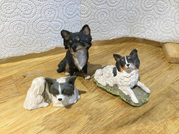 Image 1 of Papillon dog statues for sale all different poses
