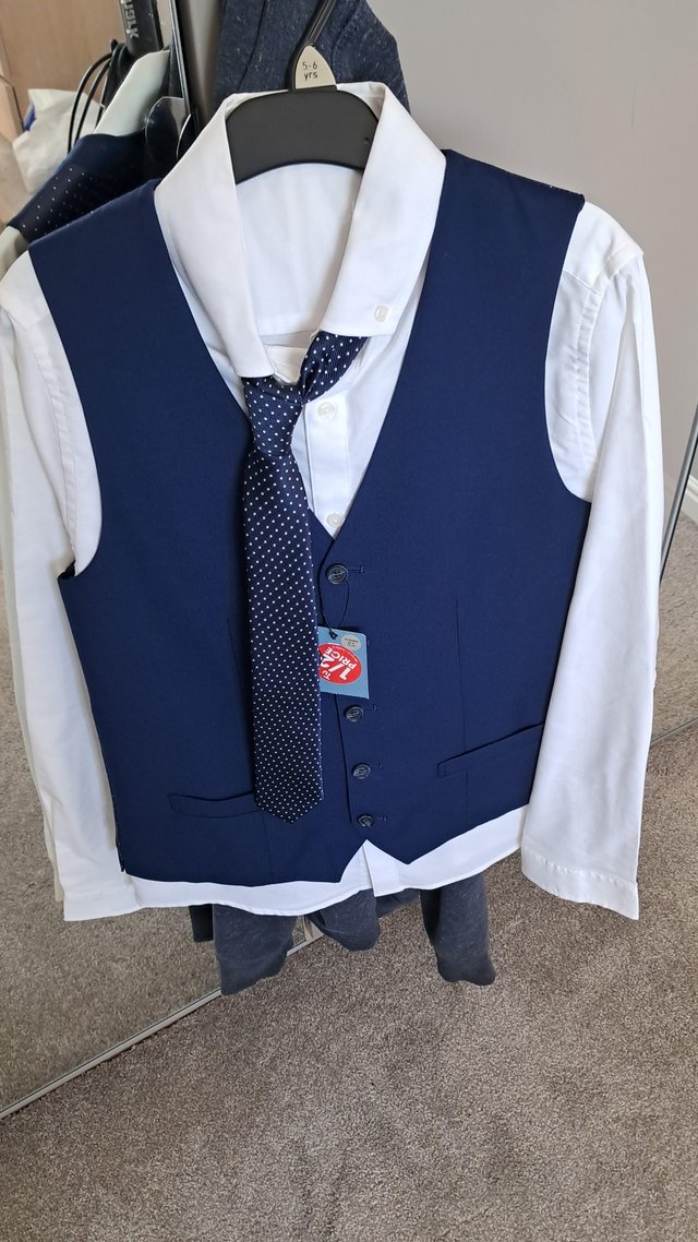 Preview of the first image of Boys Blue Suit Jacket, Waist coat, shirt and tie.