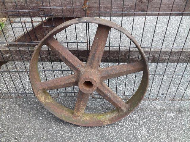 Preview of the first image of Farmyard cast iron wheel garden feature.