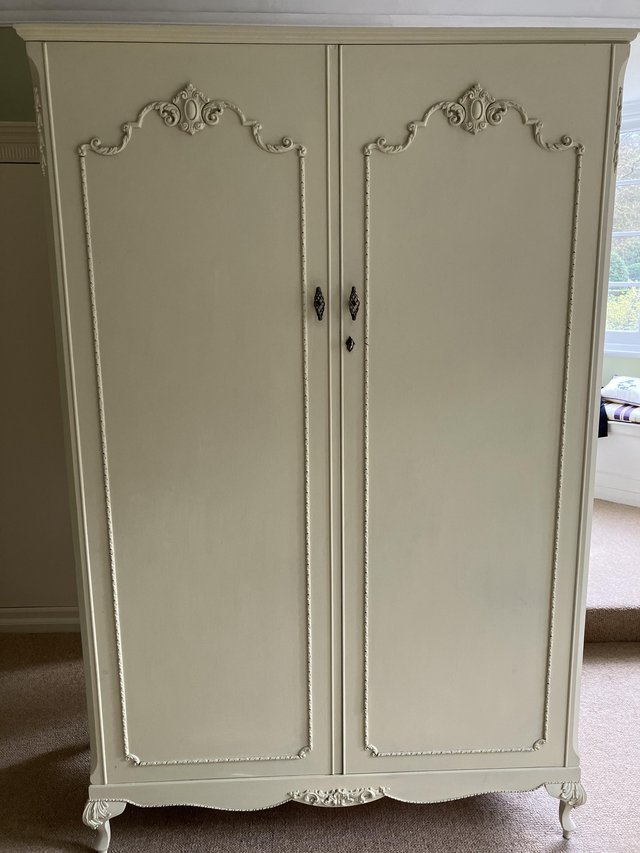 Preview of the first image of Wardrobe painted in cream quality walnut interior..