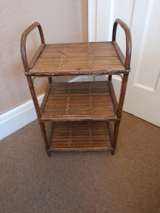 Preview of the first image of Lovely vintage bamboo table /shelves unit.