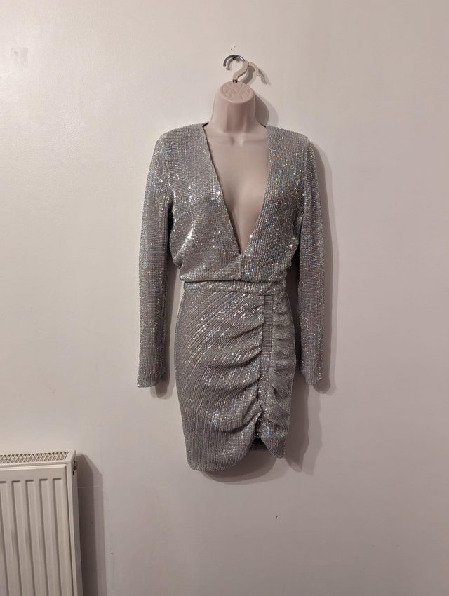Preview of the first image of Gorgeous Lavish Alice Irridescent Silver Sequin Mini Dress.