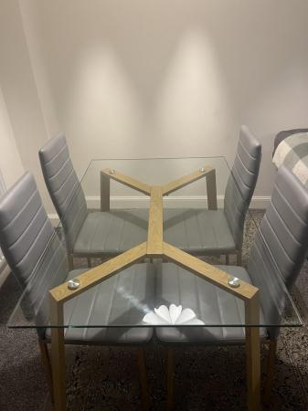 Image 1 of Glass dining table with 4 chairs
