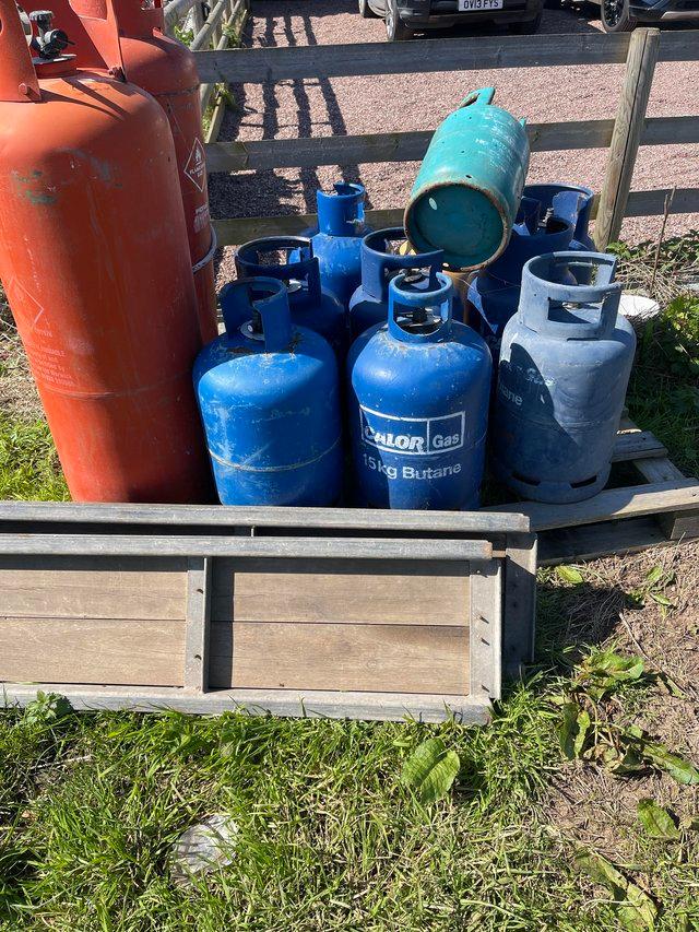 Preview of the first image of Various calor gas bottles as seen on photo.