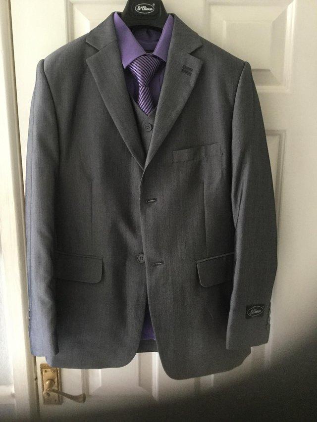 Preview of the first image of Boys teenager grey three piece suit..