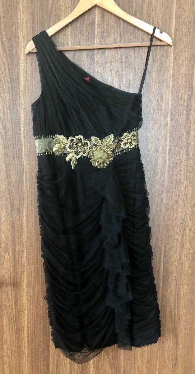Preview of the first image of Black cocktail dress, size 8.