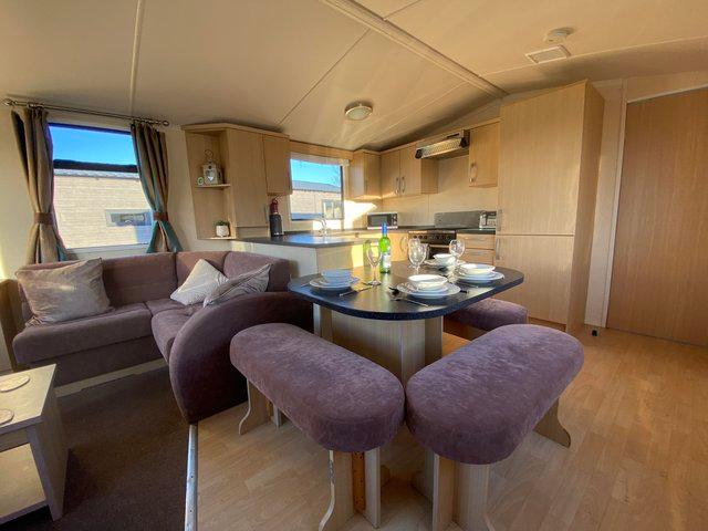 Preview of the first image of REDUCED 3 BEDROOM 2 BATHROOM SIDE DECKING CARAVAN.