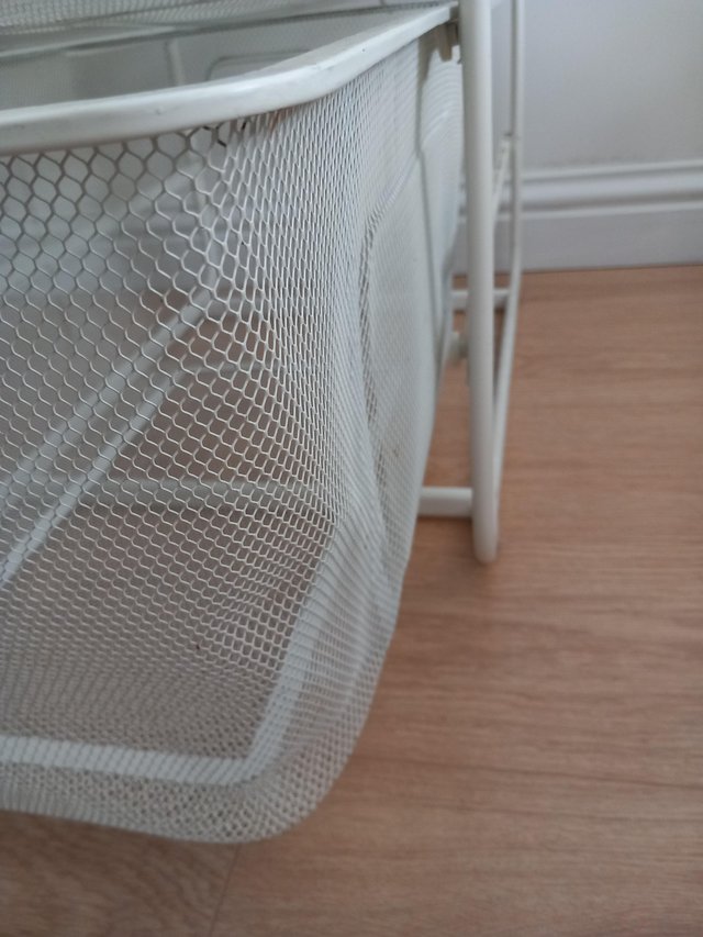 Preview of the first image of Ikea Algot storage/hanging system with mesh baskets.
