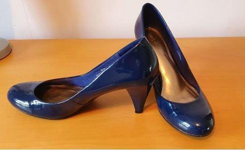 Preview of the first image of Ladies Navy patent court shoes.