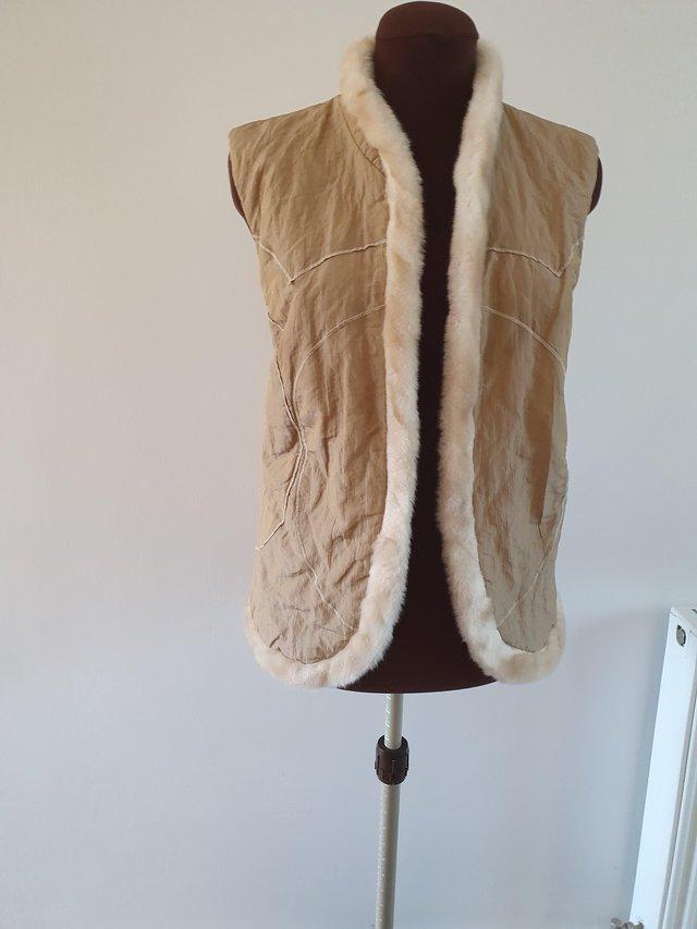 Preview of the first image of Distinctive Dressy Faux Fur Trimmed Gilet.