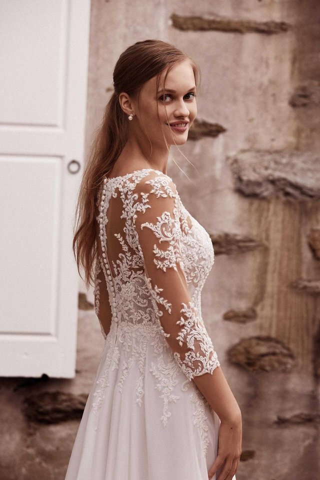 Preview of the first image of Lace sleeved Justin Alexander Serenity 44266 wedding dress.