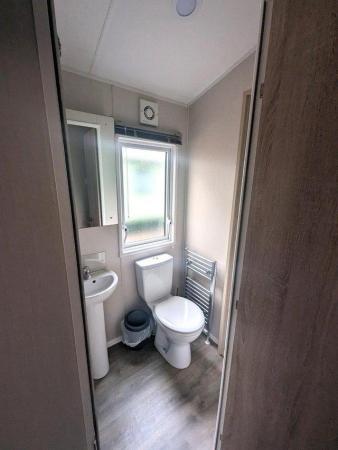Image 13 of Charming 3-Bedroom Caravan for sale at White Cross Bay Holid