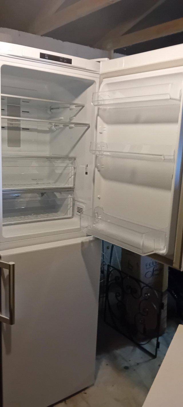 Preview of the first image of Hotpoint Fridge freezer XECO85.