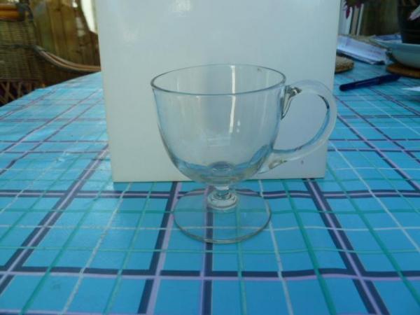 Image 1 of 3 small glasses with handles on a stem