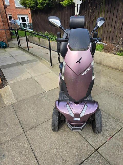 Preview of the first image of Purple mobility scooter used.