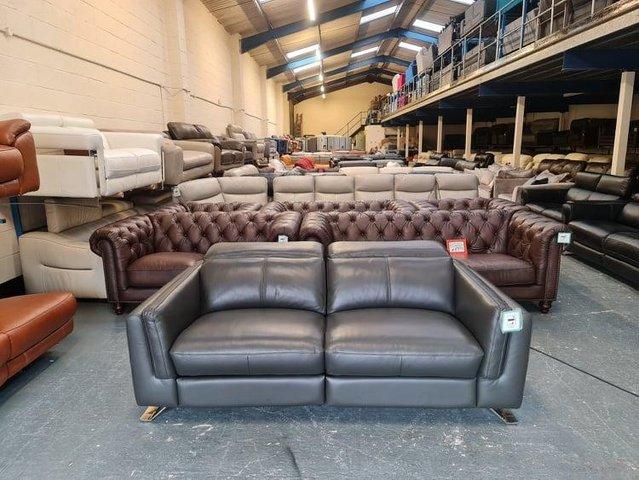 Preview of the first image of Sandro charcoal leather electric recliner 3 seater sofa.