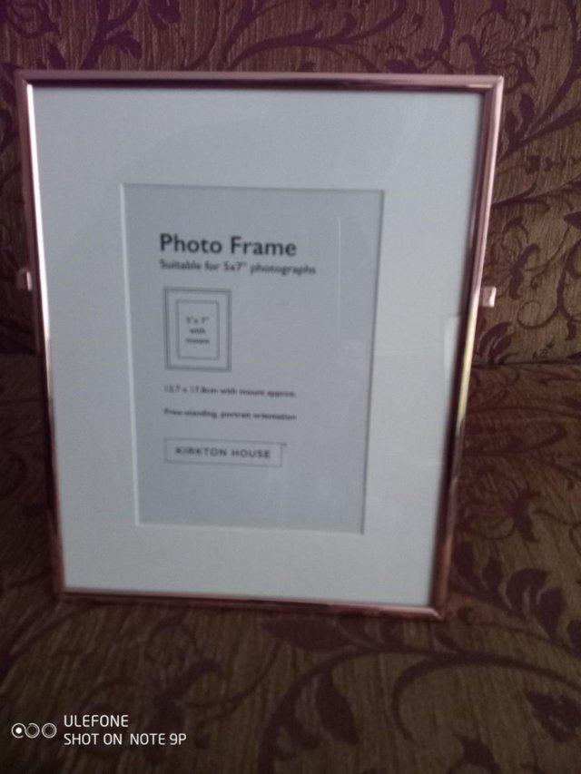 Preview of the first image of Metal free standing photo frame, rose gold colour, BNIB.