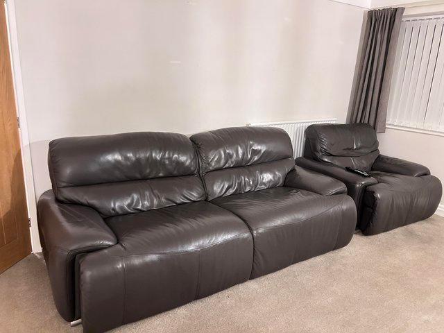 Preview of the first image of DFS large leather recliner sofa.