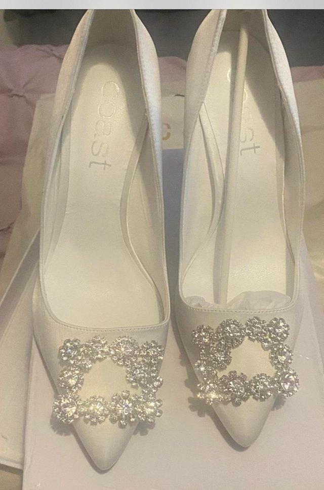 Preview of the first image of White wedding shoes from Coast.