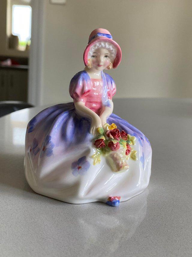 Preview of the first image of Small royal doulton figurine called monica.