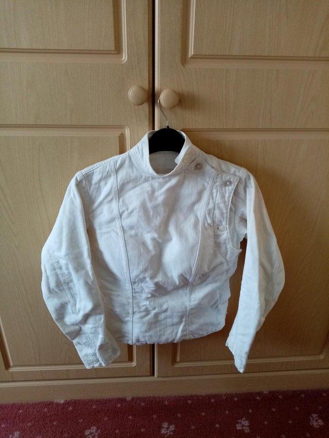 Preview of the first image of SMALL LADIES FENCING JACKET.......