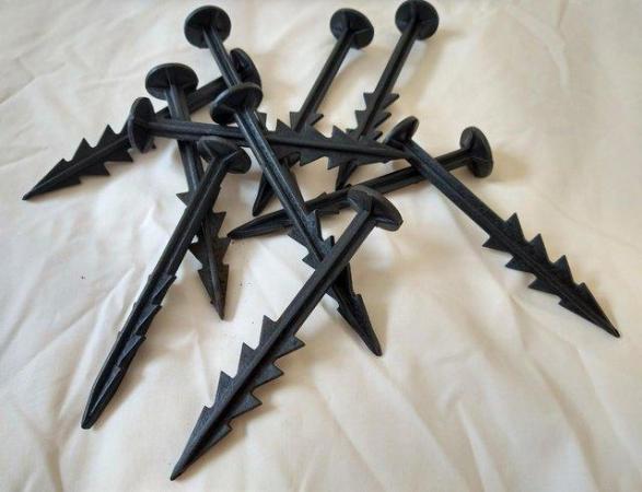 Image 1 of 150 pegs for landscape fabric or weed control fabric