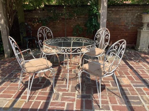 Image 1 of Vintage metal outdoor table and chairs